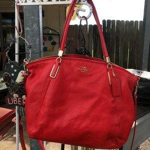 Reddish orange coach handbag medium large
